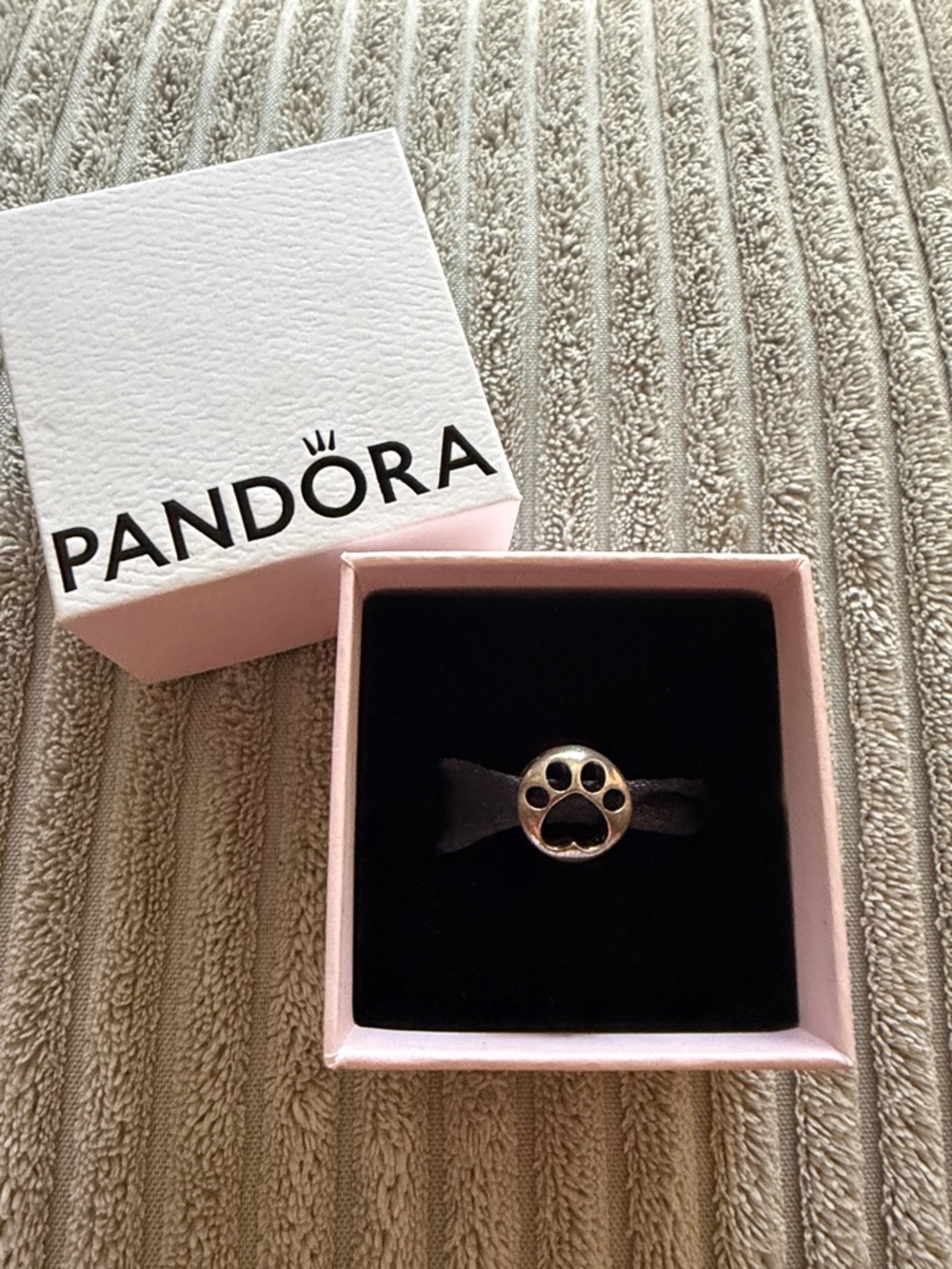 Brand New. Pandora Silver Paw Print Charm with Box Accent